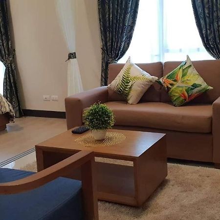 Mactan Newtown Deluxe Island Breeze Apartment มักตัน ภายนอก รูปภาพ