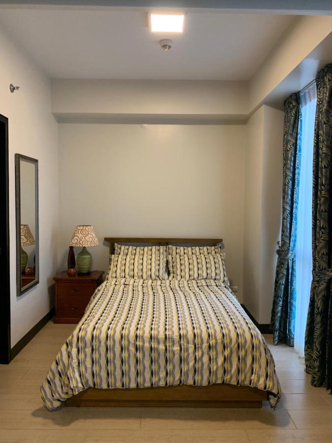 Mactan Newtown Deluxe Island Breeze Apartment มักตัน ภายนอก รูปภาพ