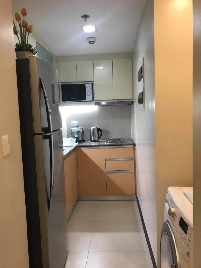 Mactan Newtown Deluxe Island Breeze Apartment มักตัน ภายนอก รูปภาพ