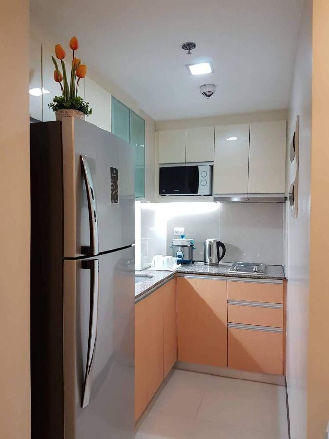 Mactan Newtown Deluxe Island Breeze Apartment มักตัน ภายนอก รูปภาพ