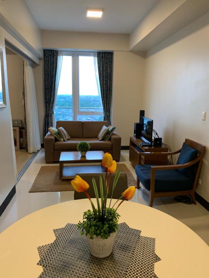 Mactan Newtown Deluxe Island Breeze Apartment มักตัน ภายนอก รูปภาพ