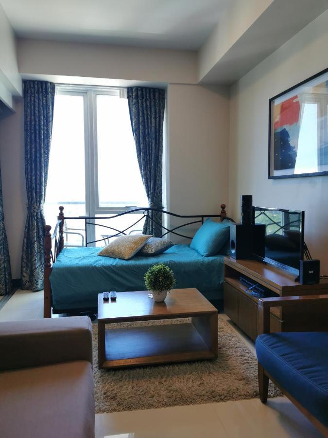 Mactan Newtown Deluxe Island Breeze Apartment มักตัน ภายนอก รูปภาพ